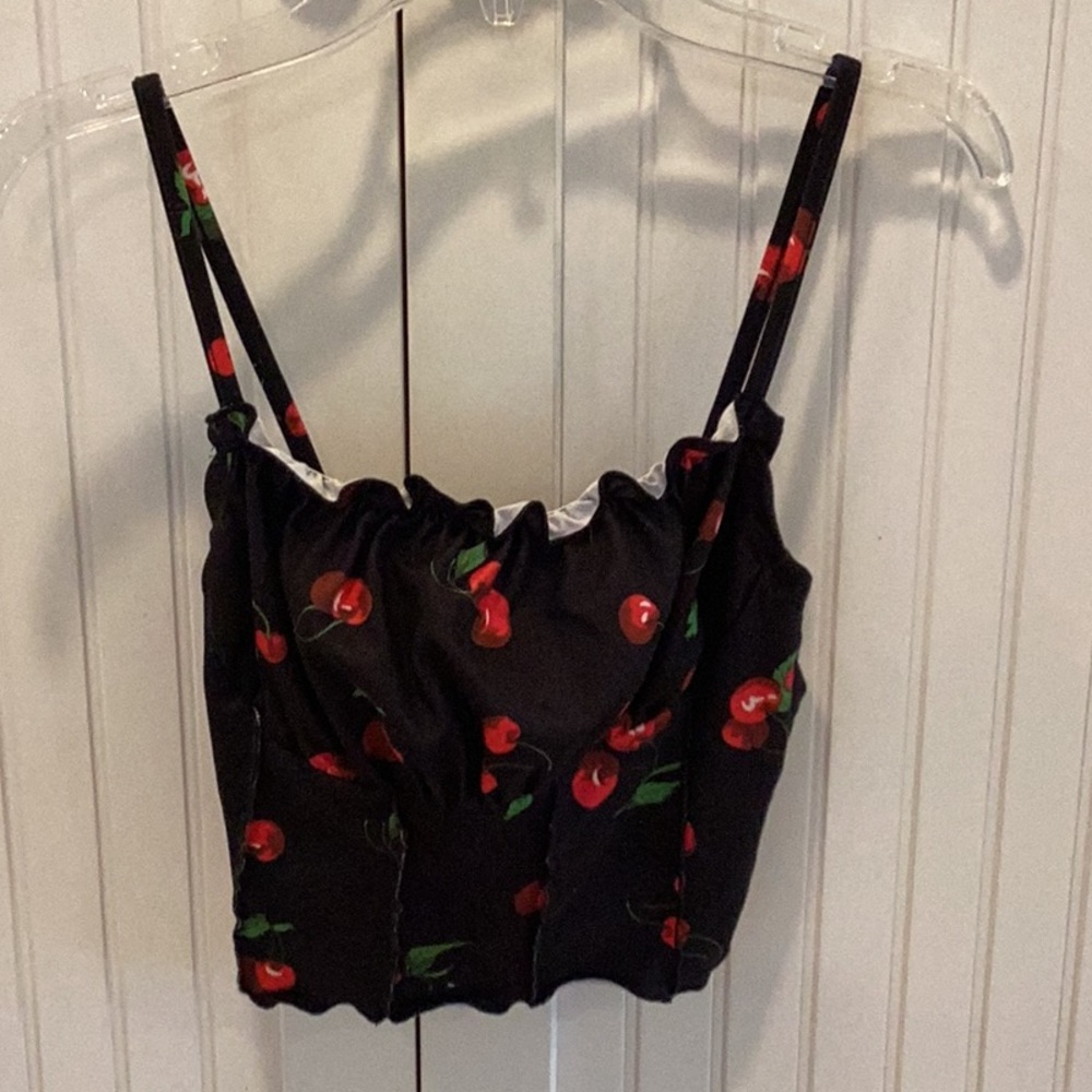 Black camisole with cherry design. Barely worn.